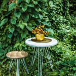 Spike table and low stool.  stylecraft.com.au Gava planter (set of two) and antique brass oval platter. cittadesign.com
